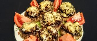 Stuffed champignons in the oven with cheese - the perfect appetizer for the festive table